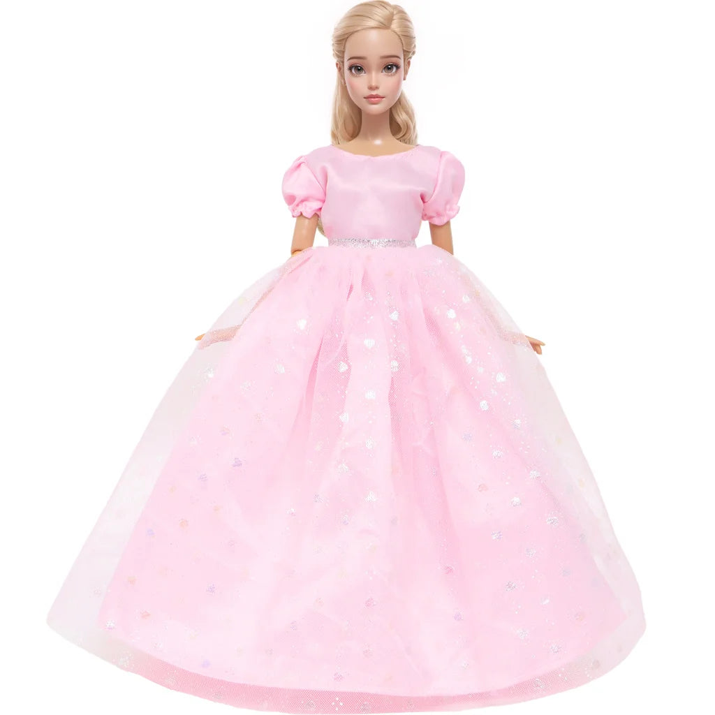 A pink elegant evening gown for a doll featuring a full skirt and delicate embellishments.