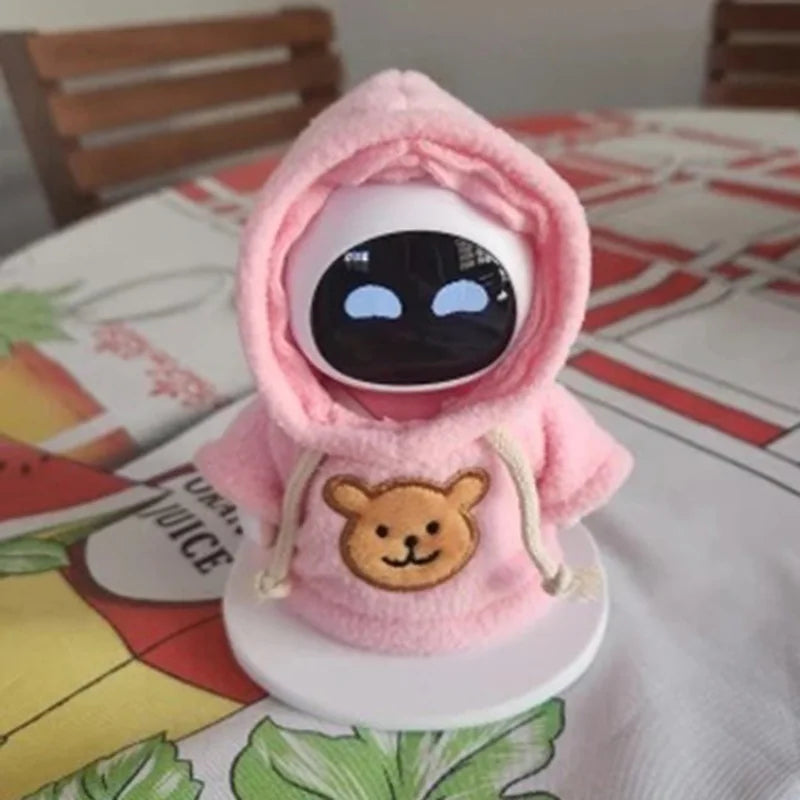 A pink hooded sweatshirt accessory featuring a bear face embroidery on the chest.