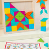 A wooden geometric shape puzzle block featuring colorful triangles and squares arranged in a frame.