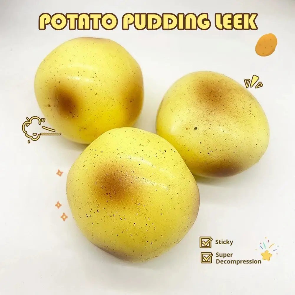 Yellow potato-shaped squishy toy with textured surface shown on a white background.