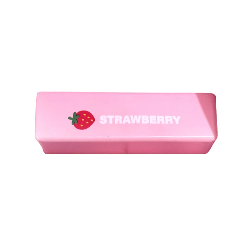 A pink rectangular strawberry shaped squishy toy with the word STRAWBERRY printed on it.
