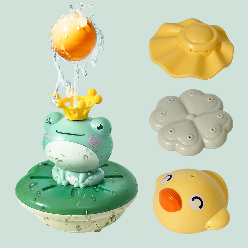 A set of floating electric water sprinkler frog bath toys in various colors including yellow, green, and light gray.