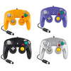 Four wired game controllers in yellow, purple, black, and silver colors shown from above.