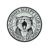 Enamel pin featuring a stylized cat face with the text Always Sleepy Club Honored Member