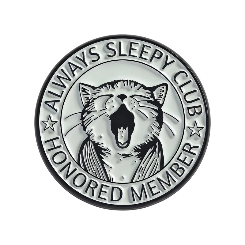 Enamel pin featuring a stylized cat face with the text Always Sleepy Club Honored Member