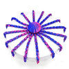 A colorful octopus desktop statue with purple and blue tentacles radiating from a central sphere.