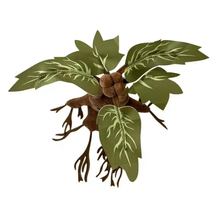 A plush toy resembling a mandrake plant with green leaves and brown roots.