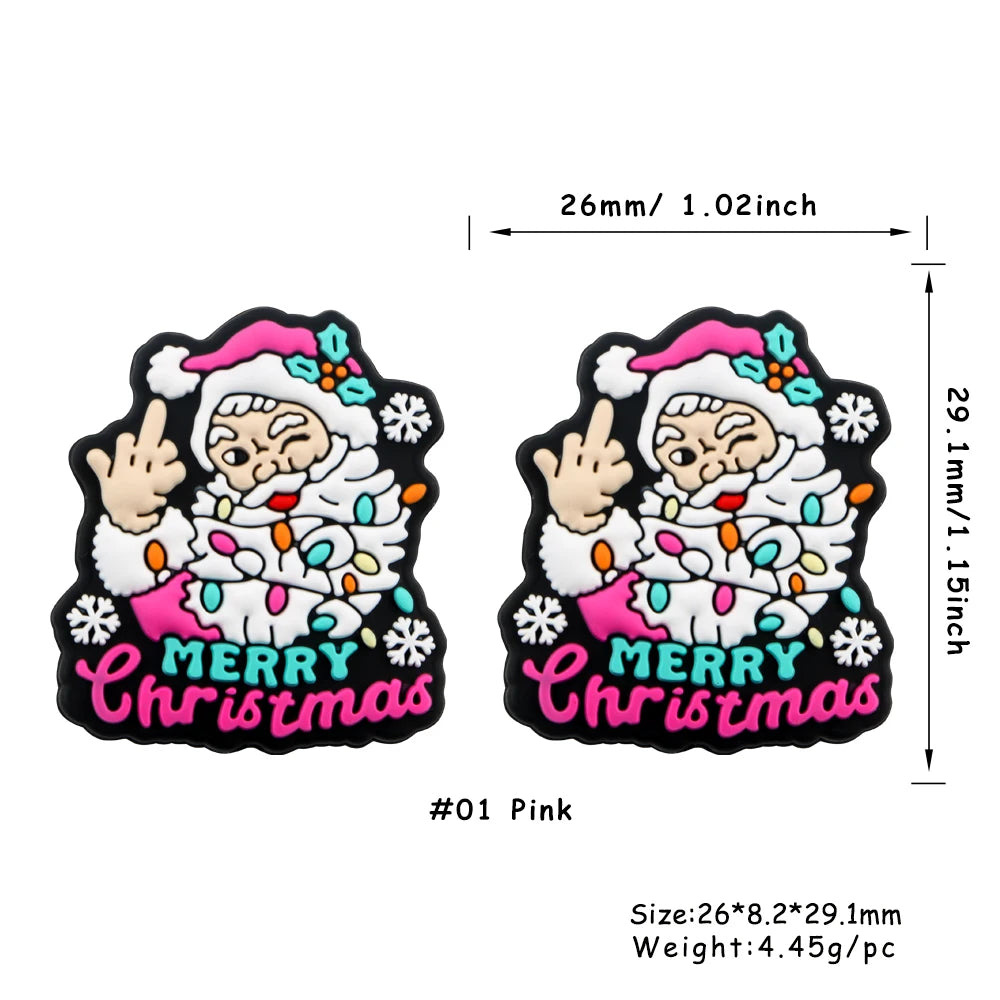 Pink silicone beads featuring a festive Christmas design with a smiling figure and holiday elements.