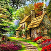 A rustic stone house with a thatched roof nestled in a lush green forest with vibrant flowers and foliage.
