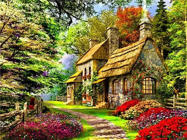 A rustic stone house with a thatched roof nestled in a lush green forest with vibrant flowers and foliage.