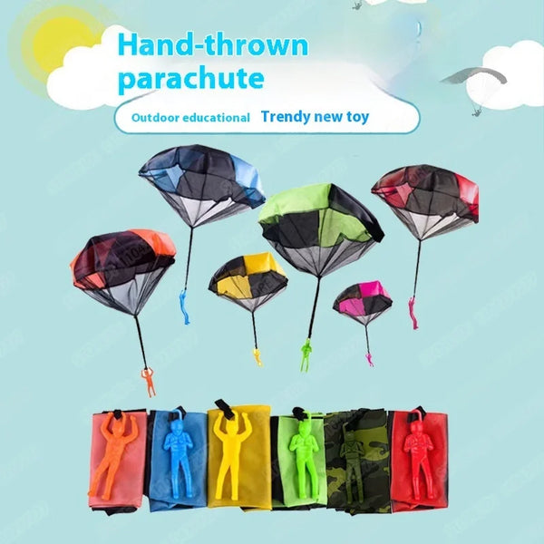 A collection of hand-thrown parachutes in various colors and shapes, including octagonal and round designs.