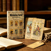 A deck of Meaning Tarot cards resting on a wooden surface next to an open book.