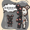 A set of brick art building blocks shaped like a bear bouquet, featuring black and white pieces.