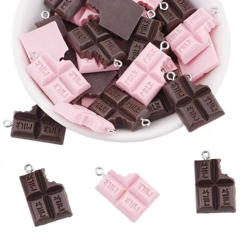 Assortment of pink and dark chocolate DIY sunflower charms for jewelry making