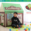 A green fabric play tent with a clubhouse design is shown, along with rolled-up fabric samples.