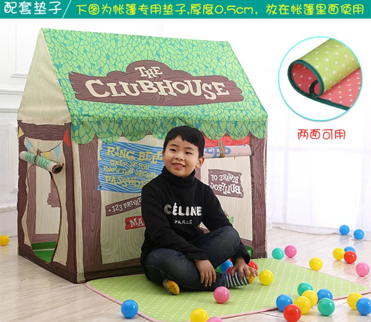 A green fabric play tent with a clubhouse design is shown, along with rolled-up fabric samples.