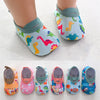 A set of colorful baby barefoot water shoes for beach and outdoor play, shown in various designs.