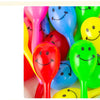 A colorful assortment of mini maracas shaker toys in various bright colors like pink, blue, yellow, and green.
