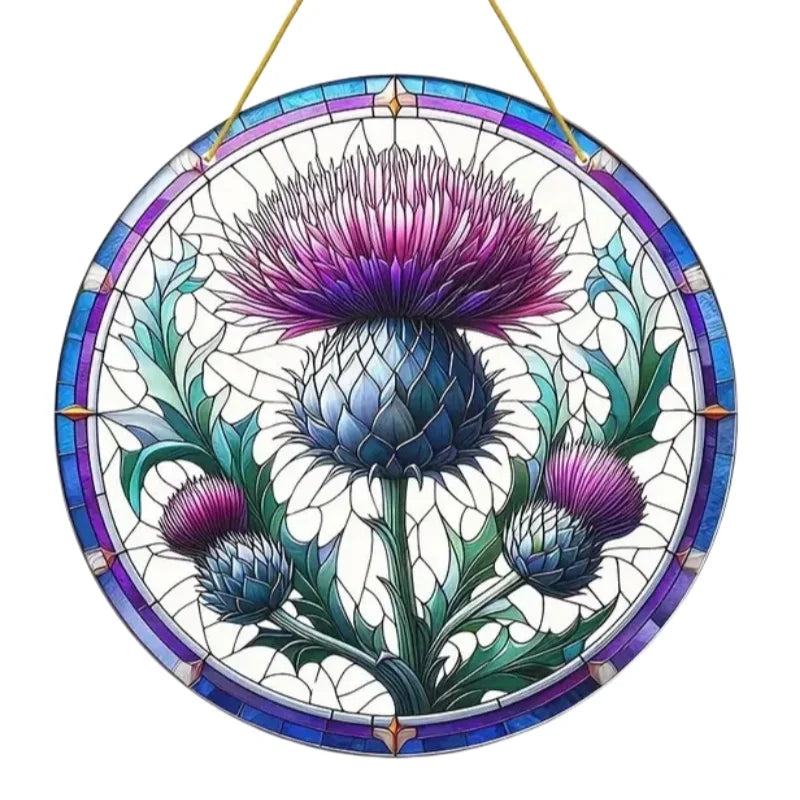 Round acrylic window hanging featuring a purple and blue Scottish thistle flower design.