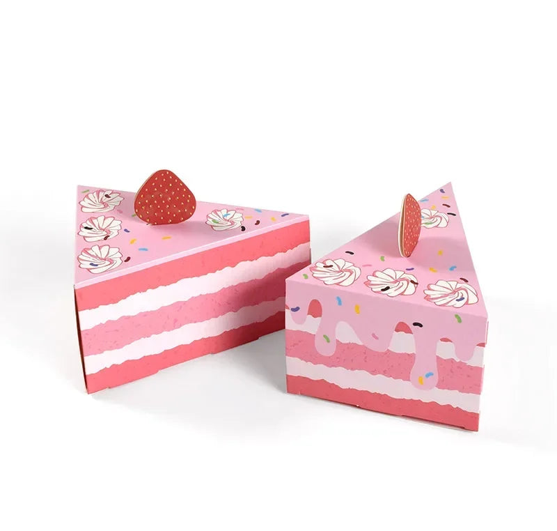 Pink and white paper gift boxes shaped like dots for party favors with a decorative lid.