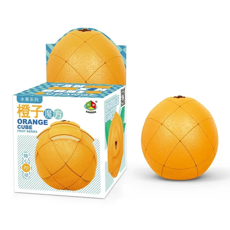 An orange fruit-shaped 3x3 puzzle cube for kids is shown next to its packaging box.