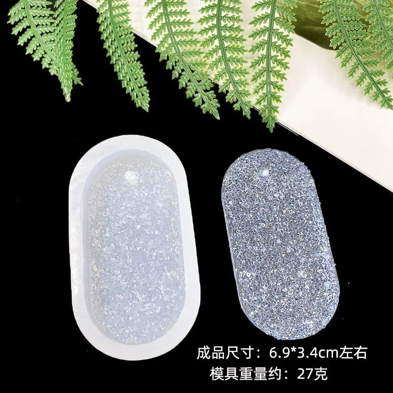 A set of flexible silicone resin molds in various shapes including heart, round, oval, and rectangle molds.