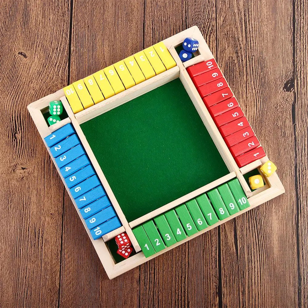 A wooden dice game board with colored dice and numbered slots for 2 to 4 players.