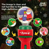 A red Christmas projection flashlight illuminating a smiling Santa Claus and reindeer figures.