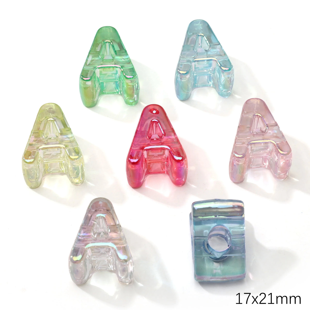 A collection of colorful acrylic alphabet beads in various shades and shapes for jewelry making