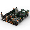 A detailed miniature haunted house set built from gray and green building blocks for Halloween decoration.