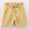 Yellow linen shorts for kids with an adjustable drawstring waist