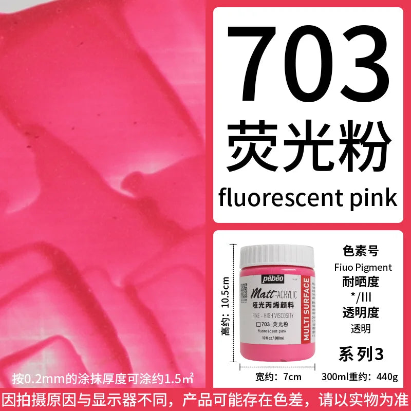 A bottle of Fluorescent Pink paint, labeled 703, showing the vibrant color.