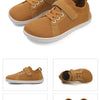 A pair of tan minimalist barefoot sneakers shown from the side and top view.