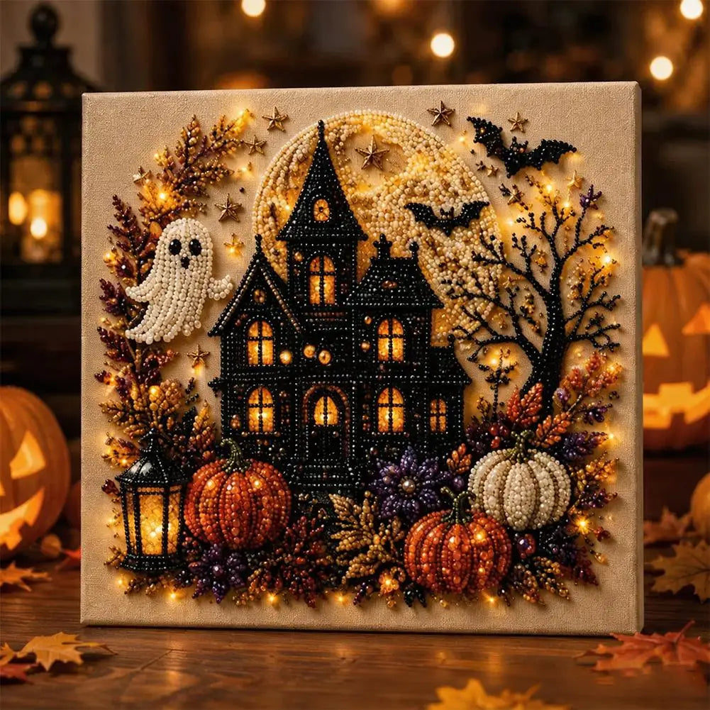 A decorative mosaic art piece featuring a black house, glowing pumpkins, and autumn foliage with sparkling lights.
