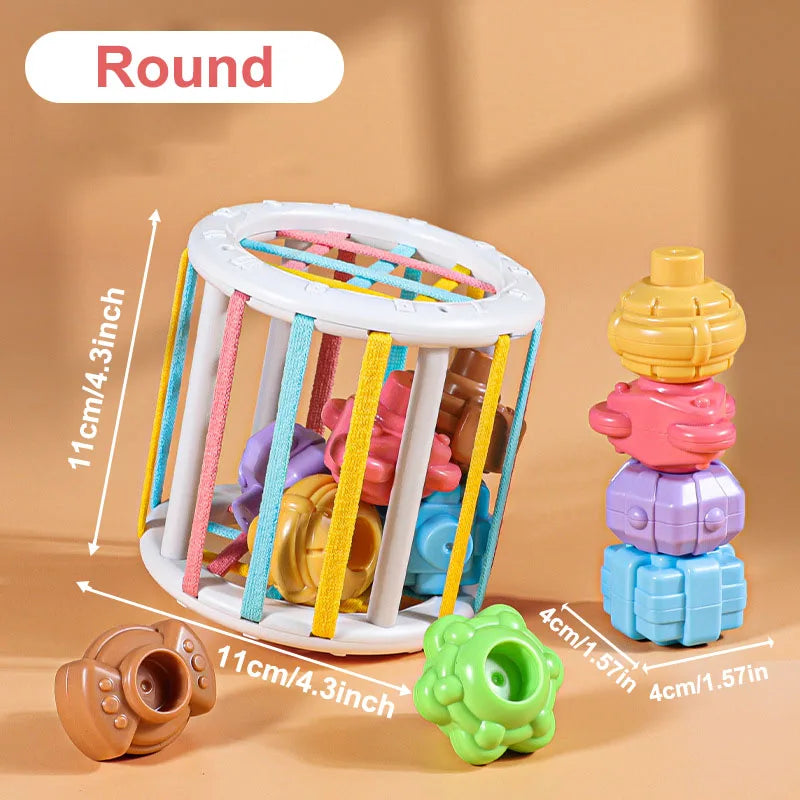 A colorful round wooden shape-sorting toy for toddlers featuring various colored wooden shapes and a small green piece.