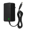 A black 24V battery charger with a green LED indicator and a cable for electric ride-on cars.