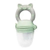 A light green silicone baby food feeder with a rounded handle and clear bowl.