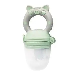 A light green silicone baby food feeder with a rounded handle and clear bowl.