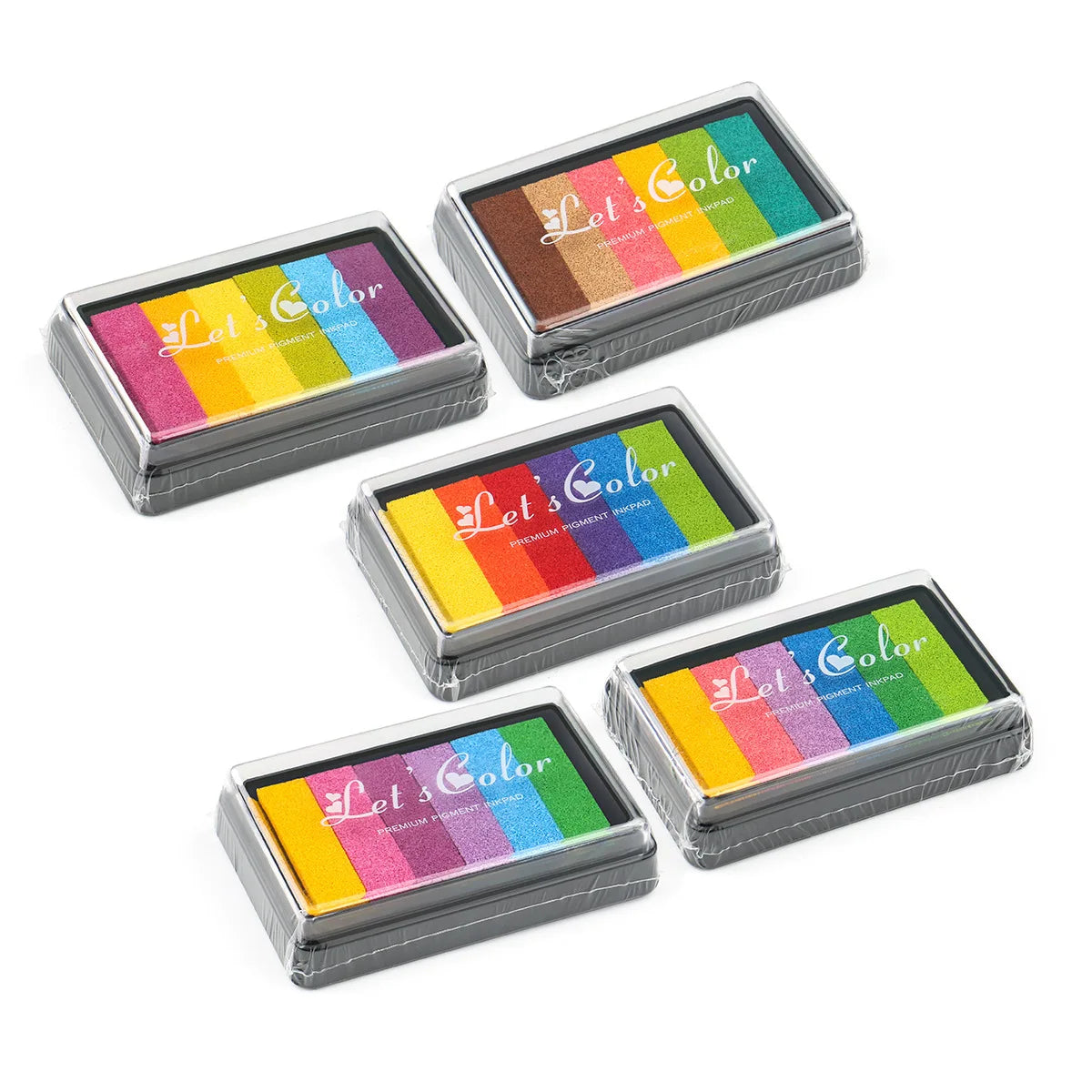 A set of six rectangular rainbow gradient ink pads for stamping and crafts.