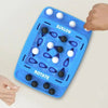 A blue strategy board game with pegs and holes is being held by a hand.