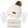 A set of white knit winter hat, scarf, and gloves with a faux fur pom.
