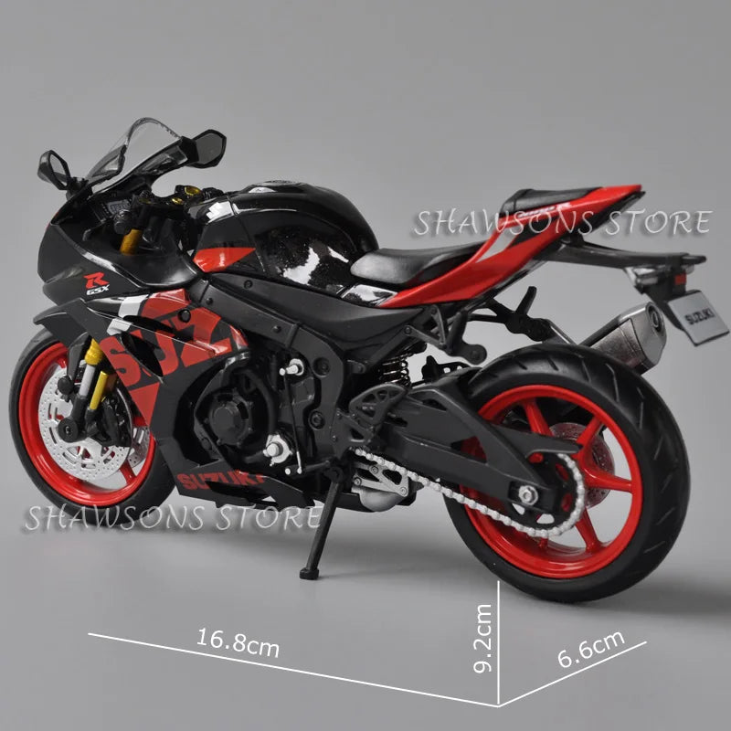 A black and red Suzuki GSX-R1000R diecast motorcycle model shown from the side.
