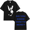 Black t-shirt featuring a white graphic of a person with raised hands.