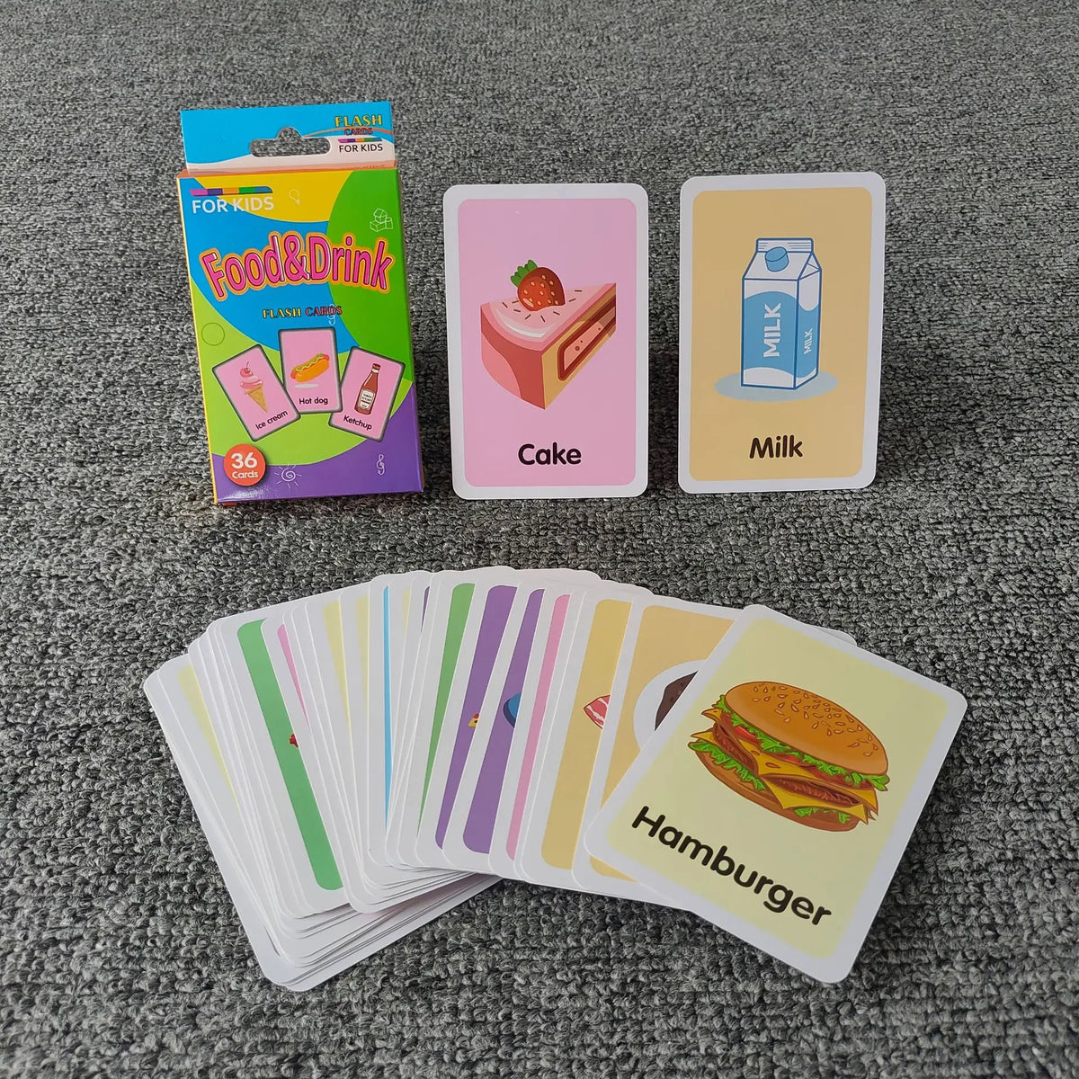 A set of colorful flash cards featuring food items like cake, milk, and hamburger for early learning.
