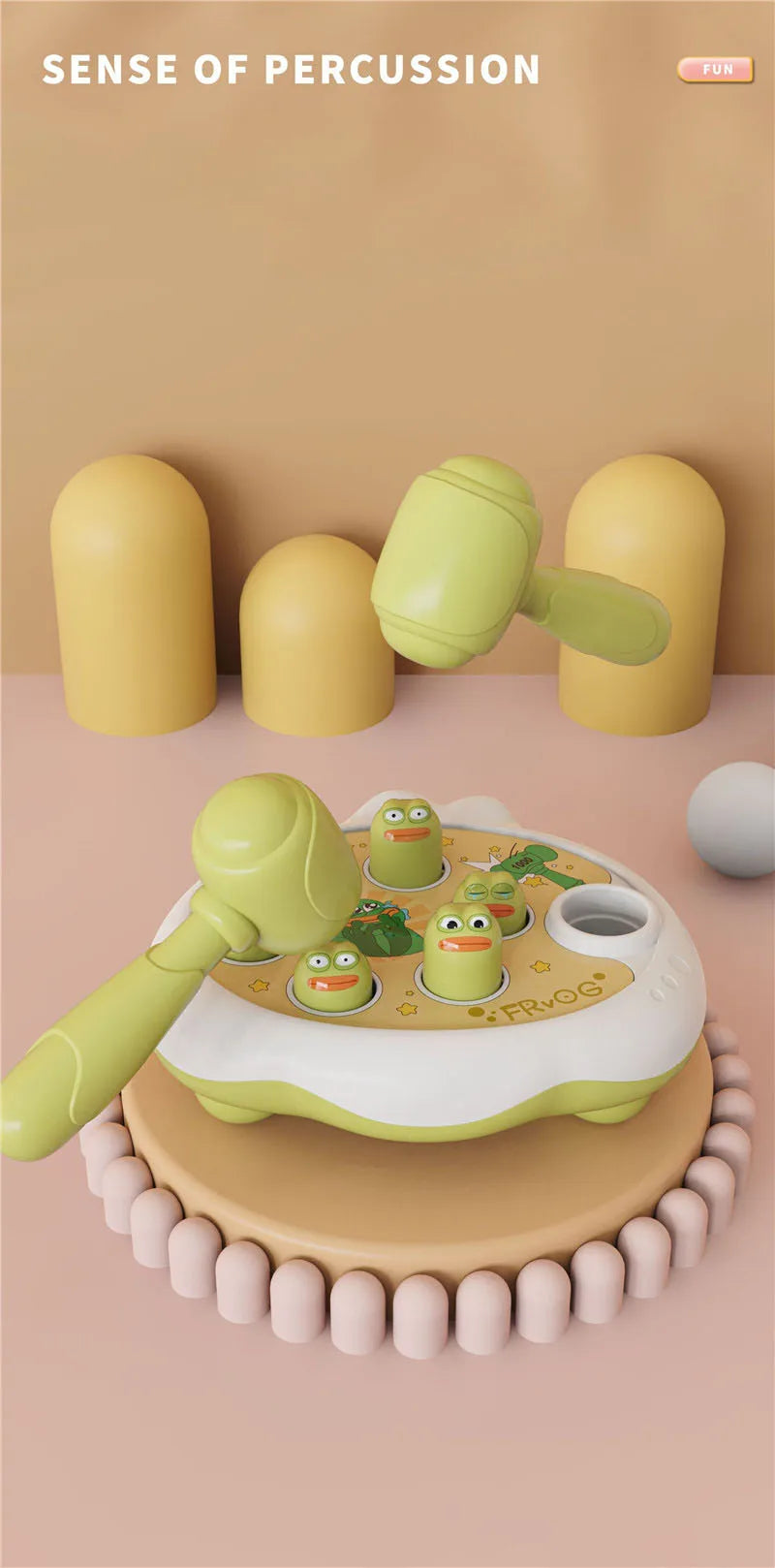 A green and yellow Montessori animal hammer toy is shown with several plastic animals on a round wooden base.