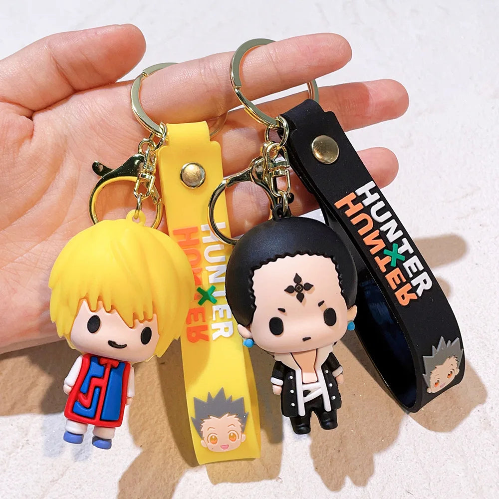 Hunter x Hunter anime character resin keychain featuring a blonde character and a dark-haired character