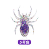A purple and silver laser-reflective flexible fishing lure spider bait with glitter accents.