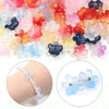 A collection of colorful cherry blossom flower glass beads in various shades of pink, orange, yellow, blue, and purple for je