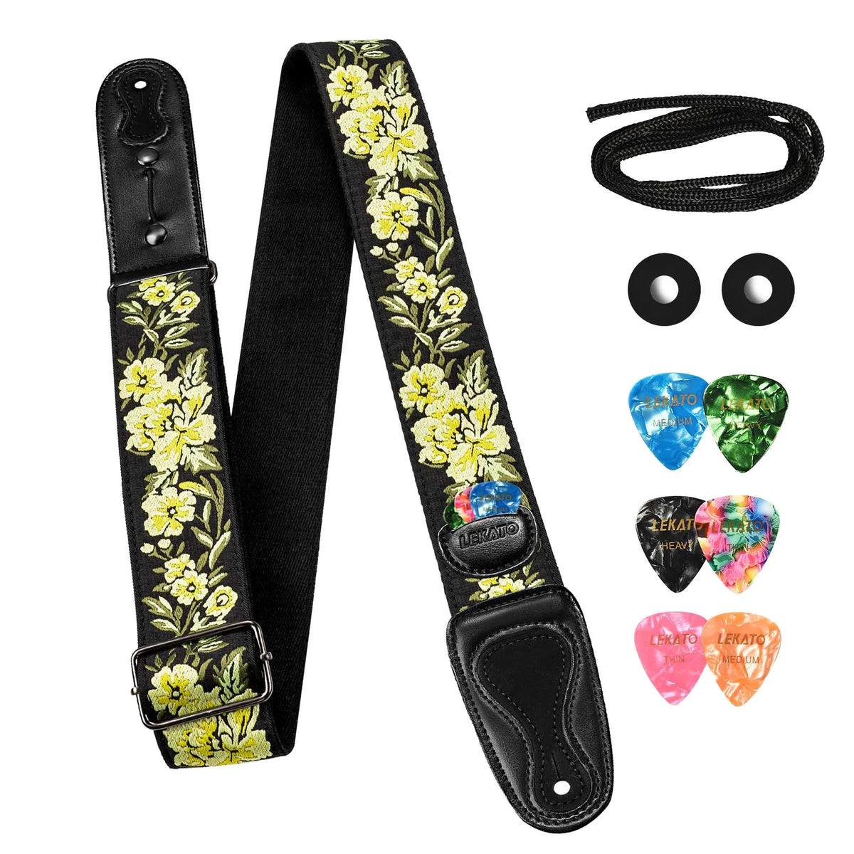 Black guitar strap with yellow floral print, including two strap locks and four guitar picks.
