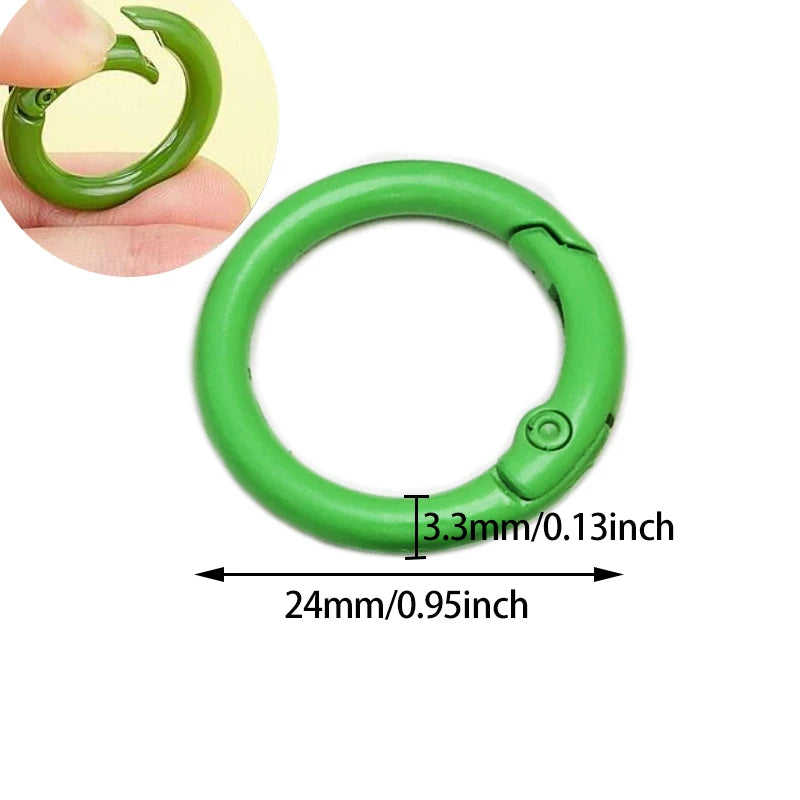 A bright green alloy snap hook keychain clip with a 24mm diameter and 3.3mm thickness.